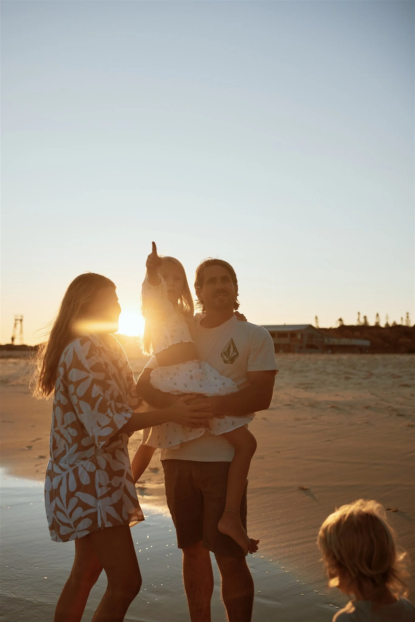 Heartfelt golden hour family moments at Redhead Beach Newcastle by Daina Marie Photography