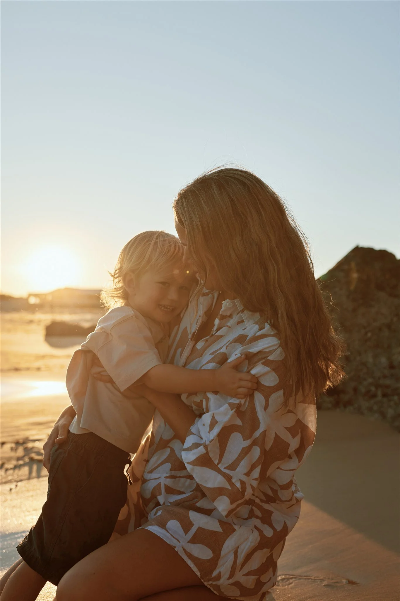 Newcastle documentary family photographer captures golden hour family session at Redhead Beach