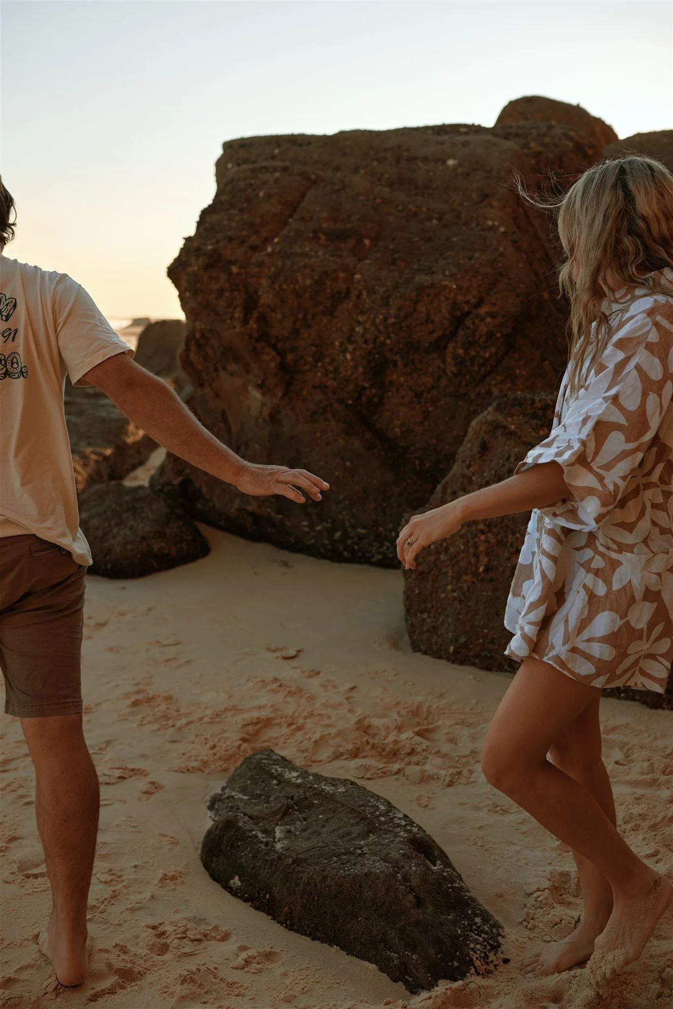 Toddler and primary school aged kids playing at Redhead Beach captured by Newcastle family photographer