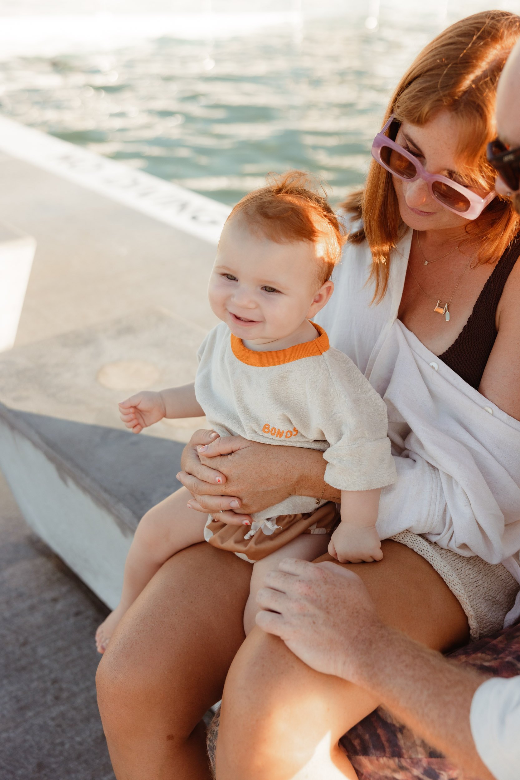 Baby's first summer at Newcastle Ocean Baths documentary family session Newcastle NSW
