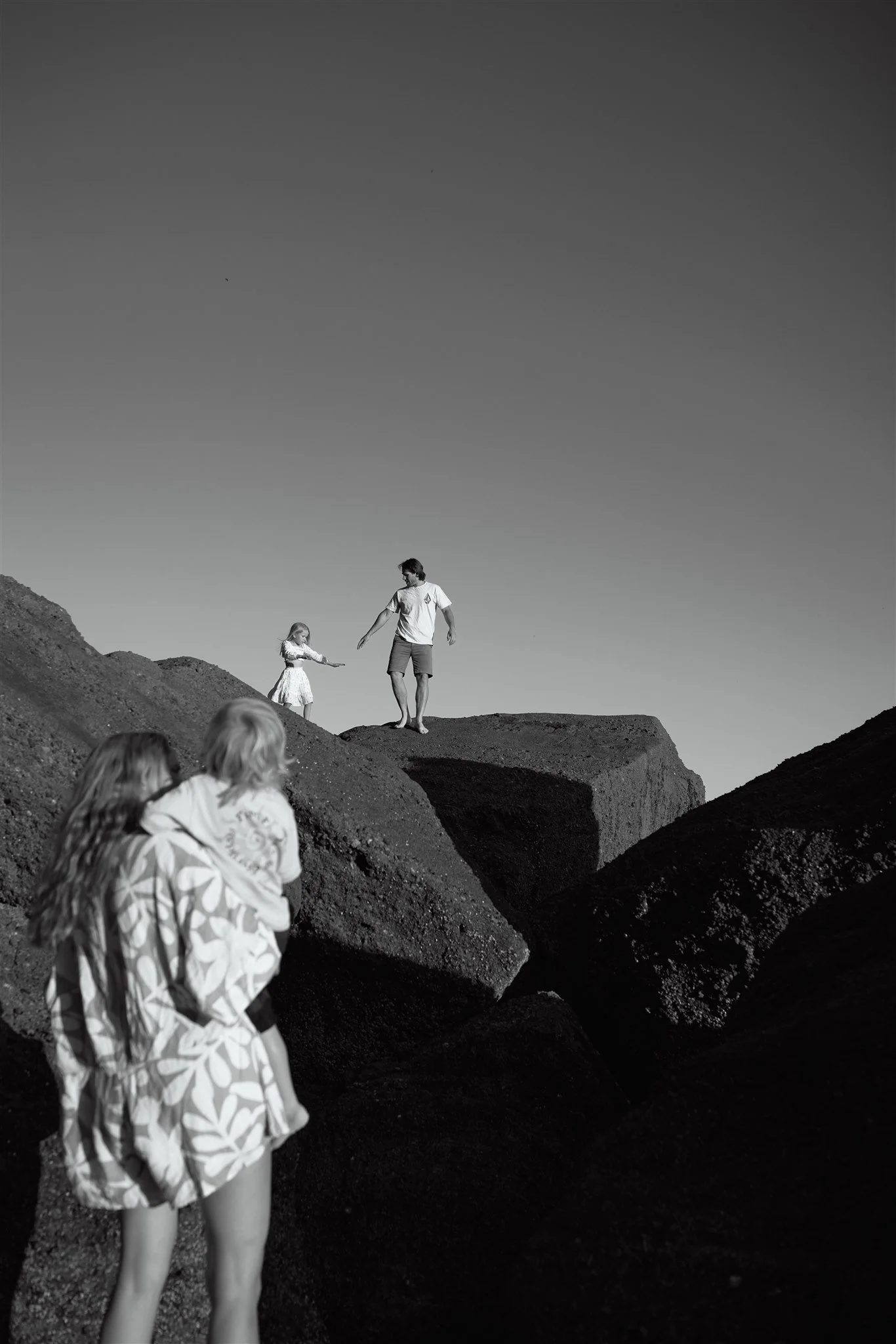 Newcastle documentary family photographer captures golden hour family session at Redhead Beach