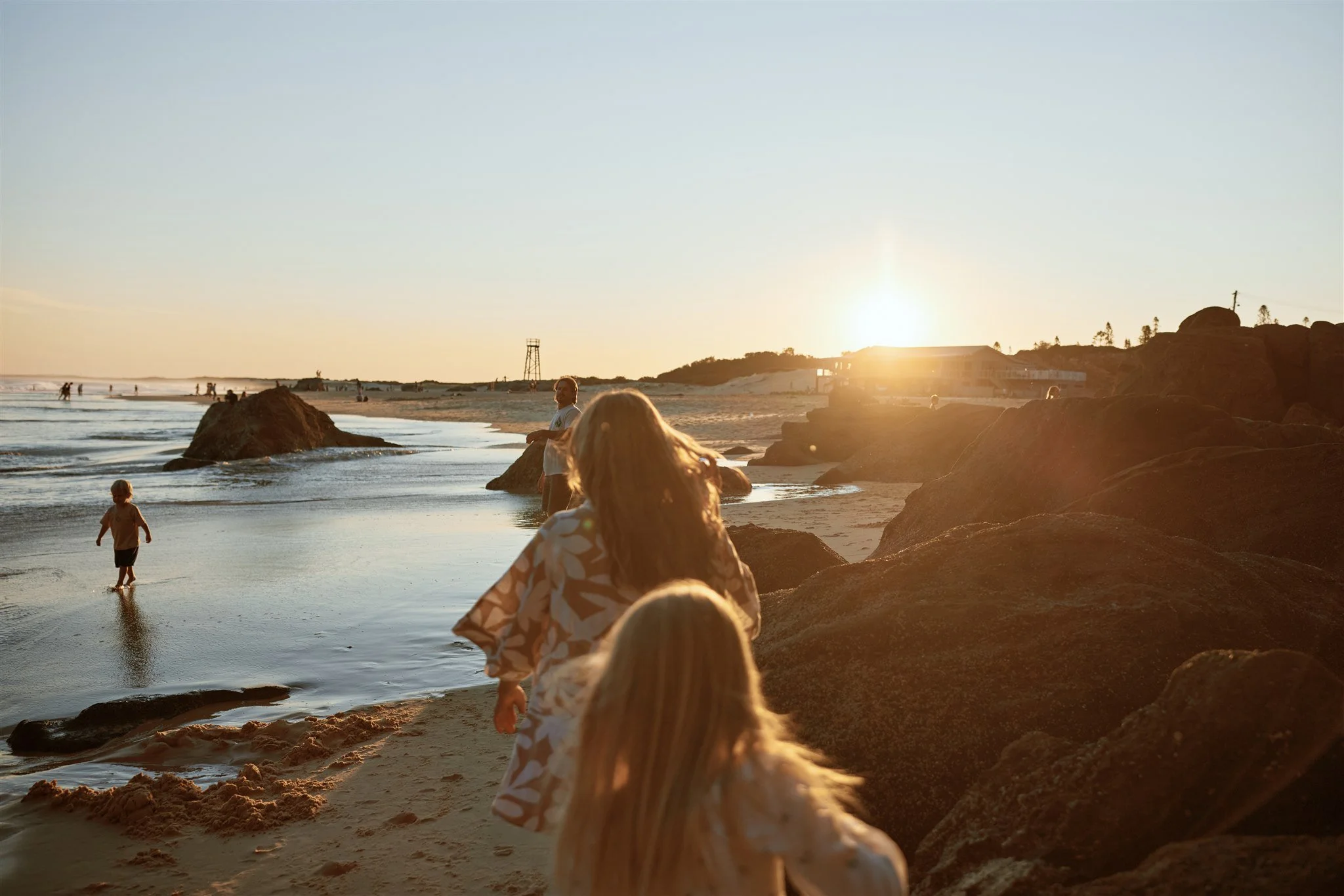 Newcastle documentary family photographer captures golden hour family session at Redhead Beach