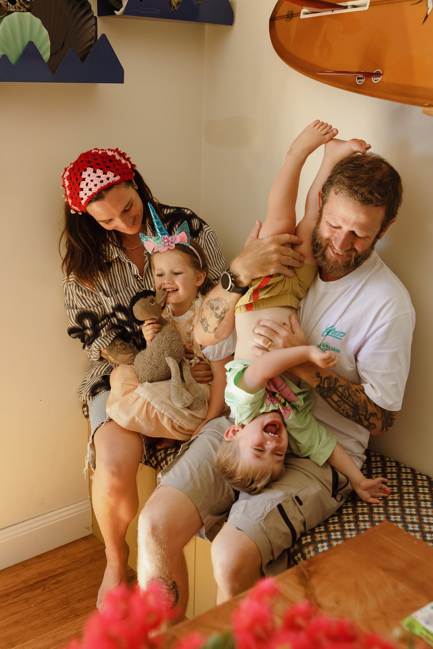 Young family of four captured at home in Newcastle by Daina Marie Photography