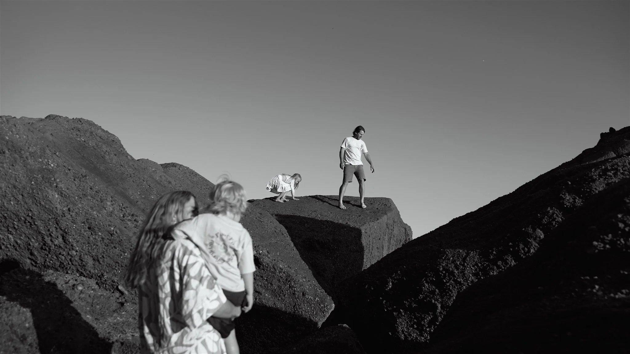Family of four at Redhead Beach Newcastle photographed by Daina Marie Photography