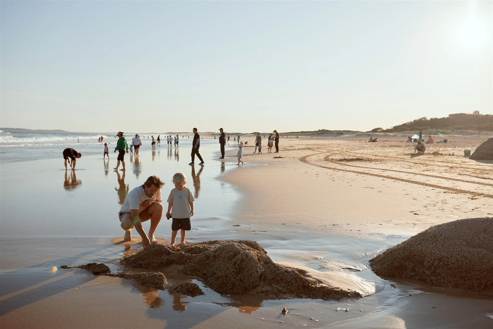 Family of four at Redhead Beach Newcastle photographed by Daina Marie Photography
