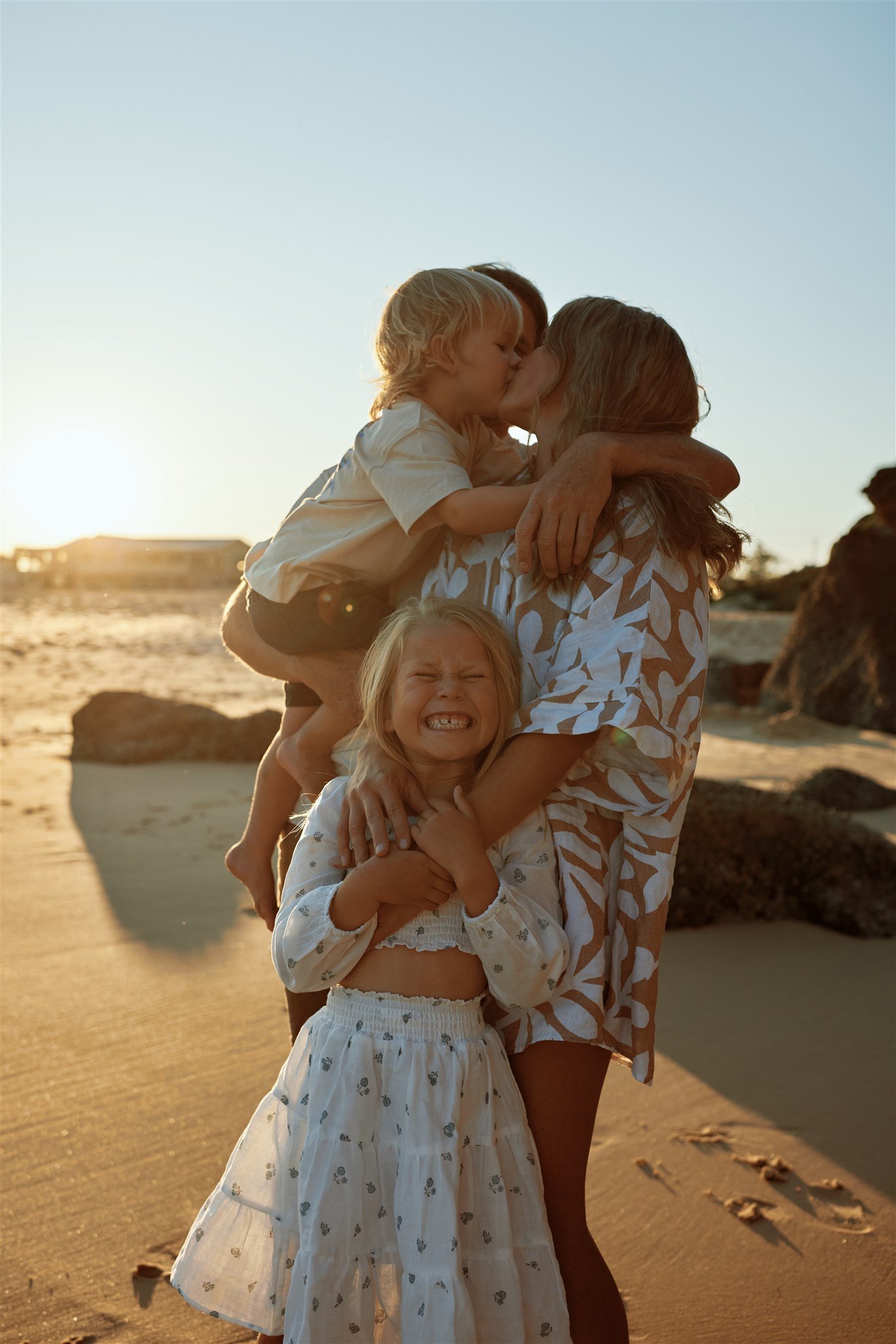 Family of four at Redhead Beach Newcastle photographed by Daina Marie Photography