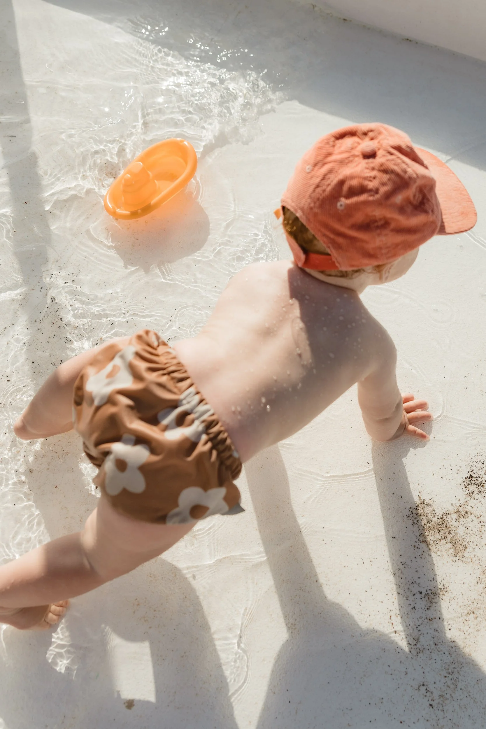 Candid family photography at Newcastle Ocean Baths by Daina Marie Photography