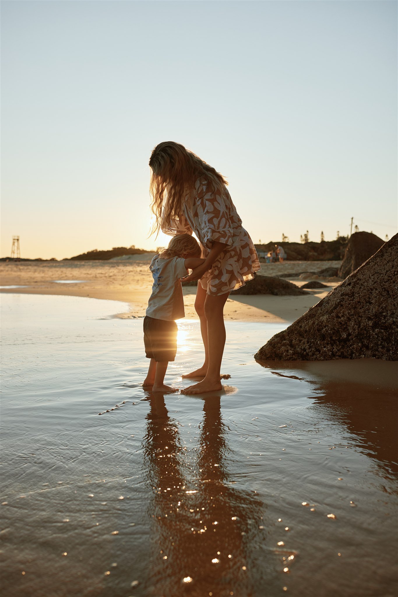 Toddler and primary school aged kids playing at Redhead Beach captured by Newcastle family photographer