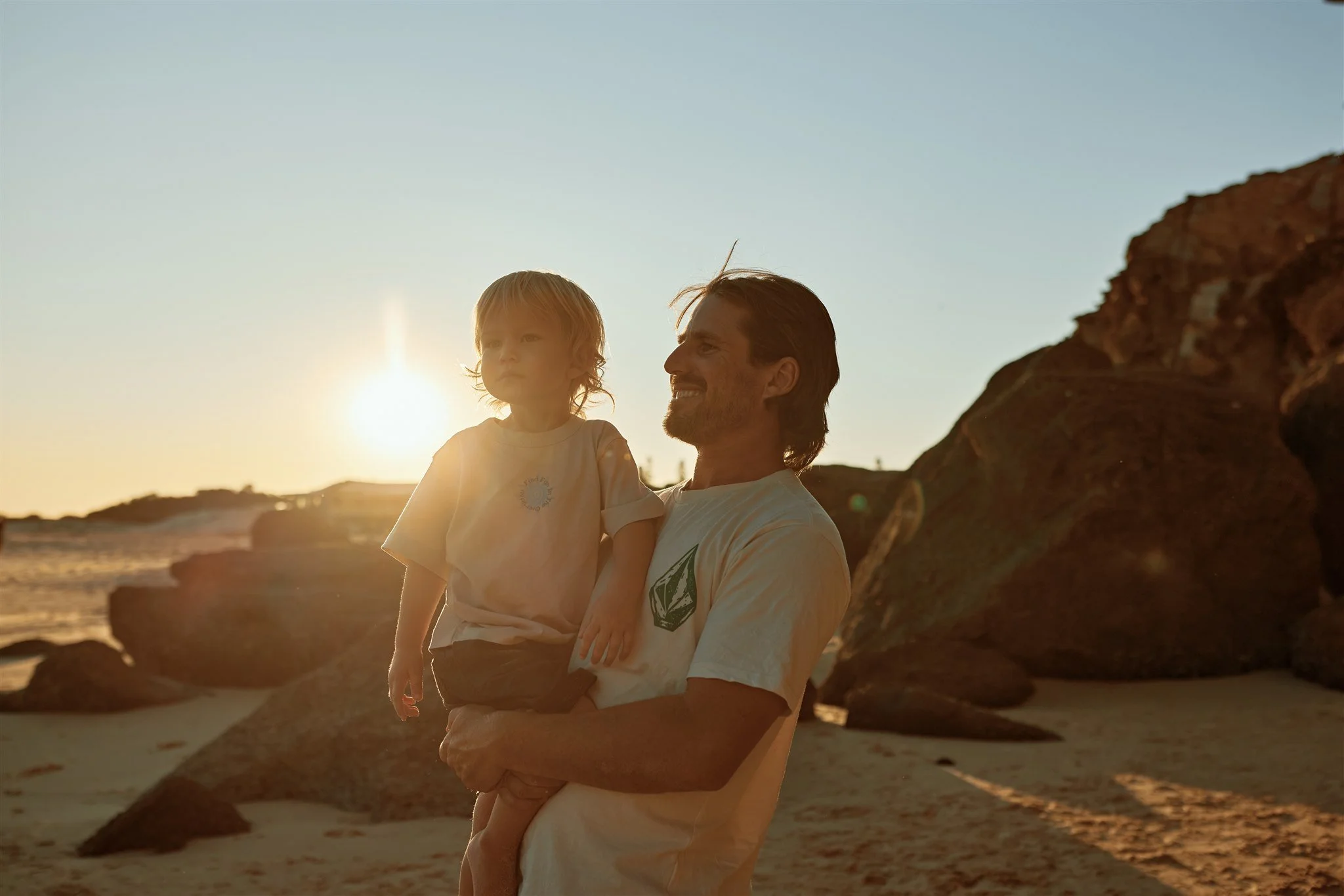 Newcastle documentary family photographer captures golden hour family session at Redhead Beach