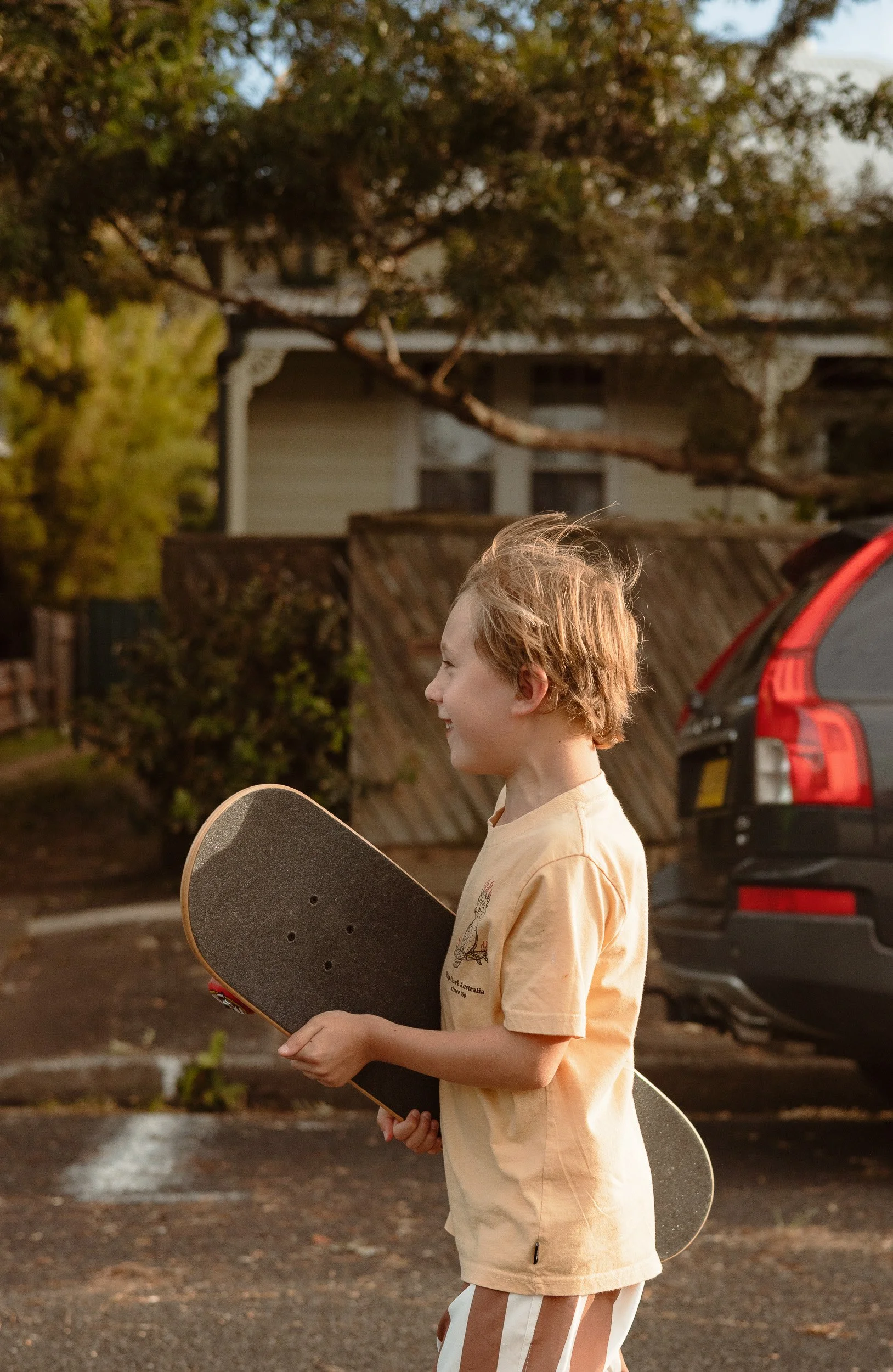 Family skateboarding through Merewether Newcastle documentary session by Daina Marie Photography
