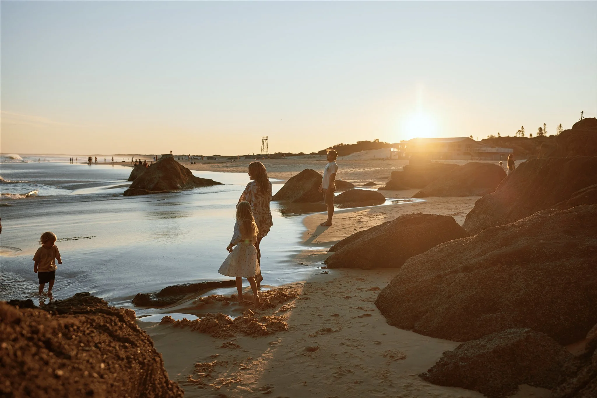 Family of four at Redhead Beach Newcastle photographed by Daina Marie Photography