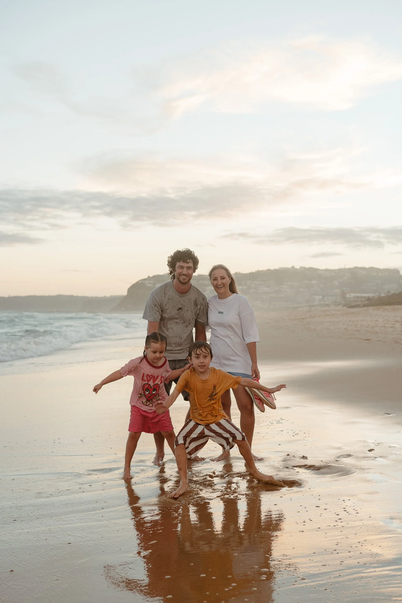 Newcastle documentary family photographer captures the Butcher family at Merewether Beach