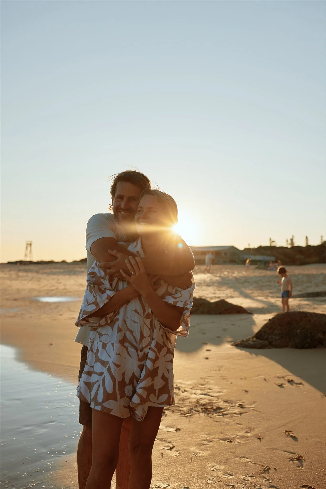 Heartfelt golden hour family moments at Redhead Beach Newcastle by Daina Marie Photography