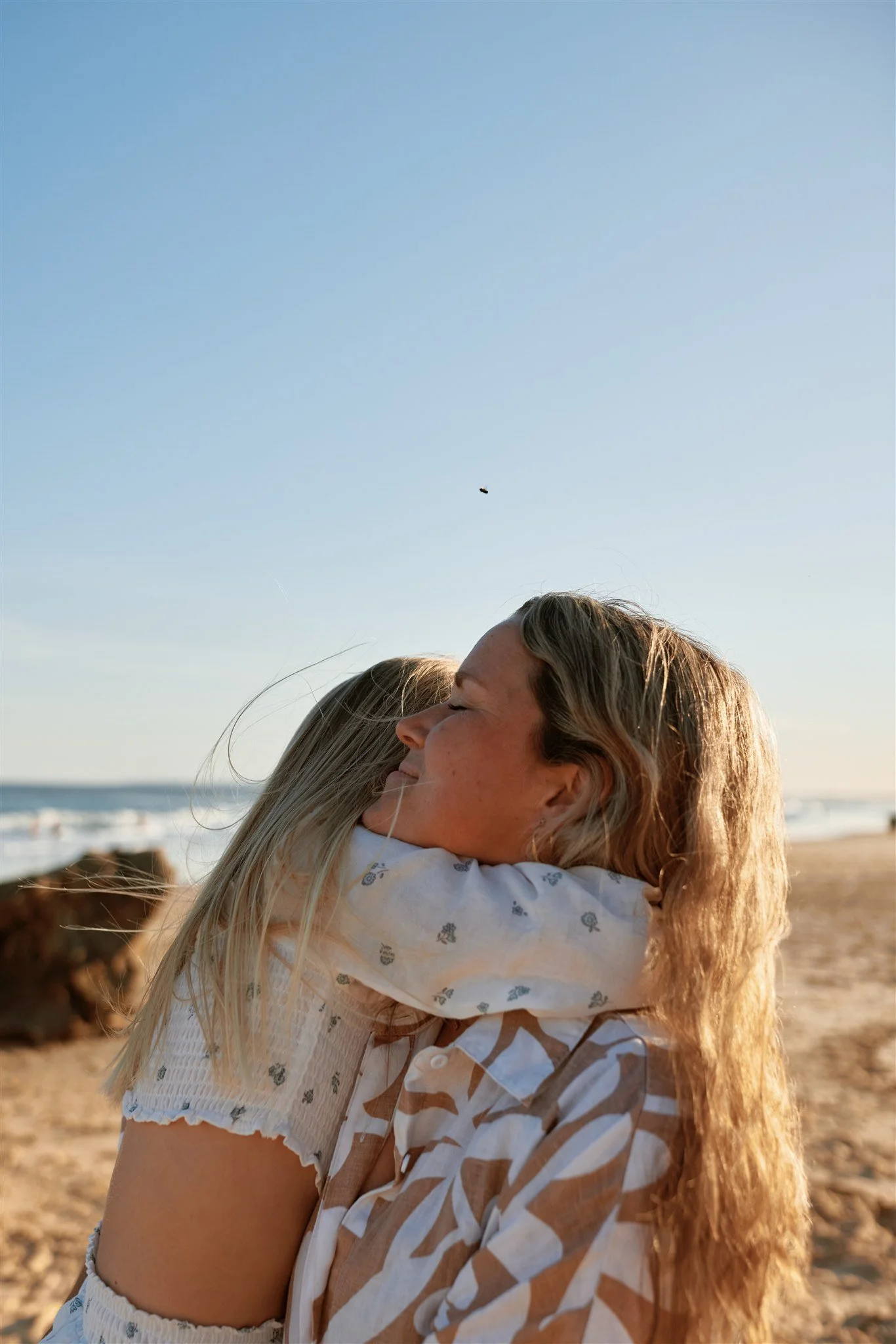 Heartfelt golden hour family moments at Redhead Beach Newcastle by Daina Marie Photography