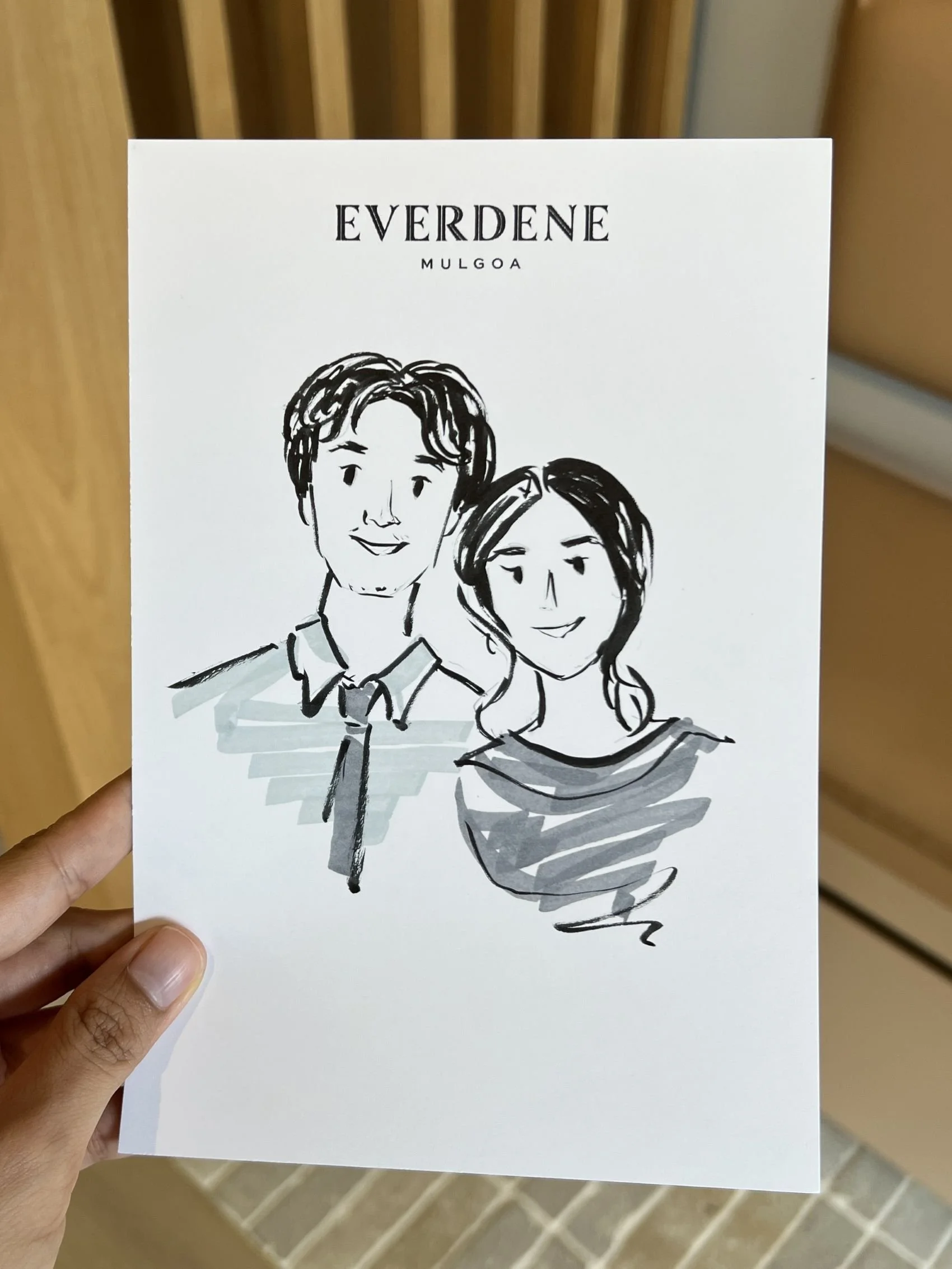 Live illustration of a couple drawn by hand