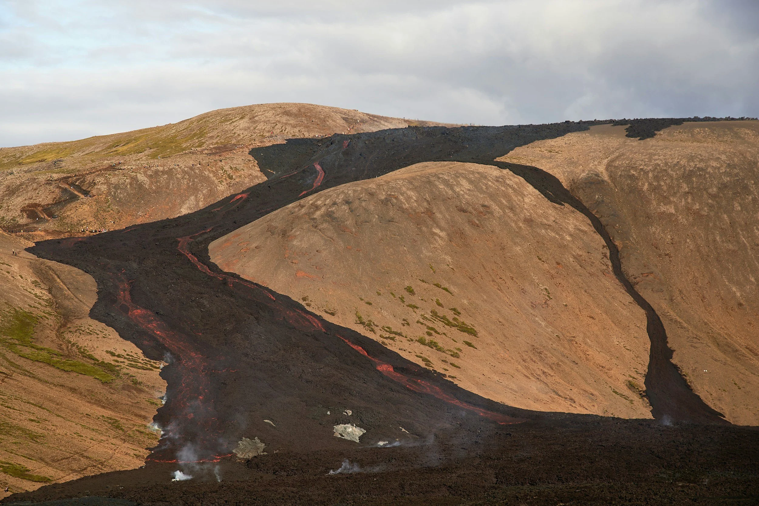 Recent lava flow and volcanic crater at Fagradalsfjall — new geological landmark in Iceland travel guide.