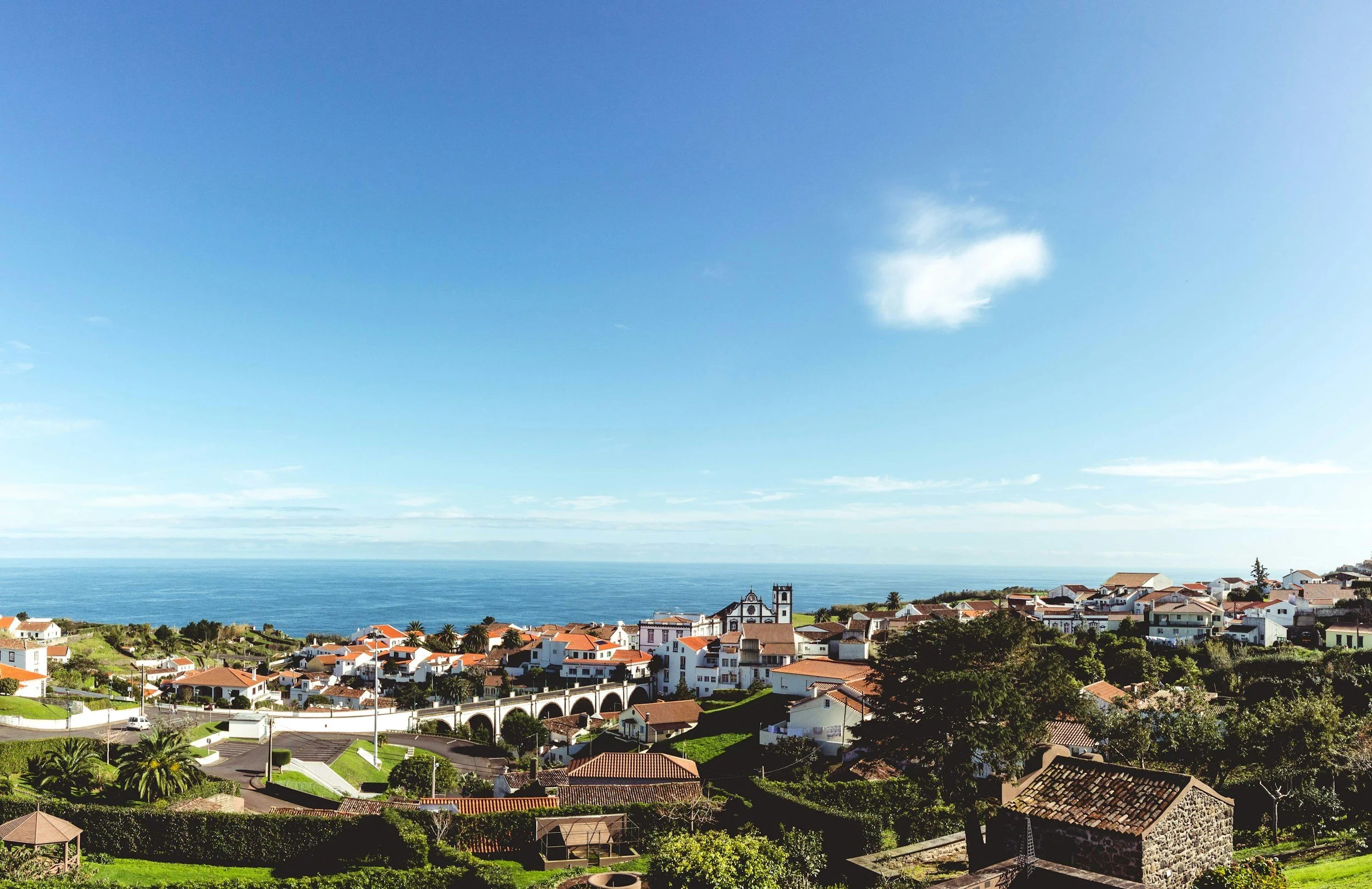 Panoramic view over São Miguel, Azores — lush green volcanic hills and crater lakes in the ultimate São Miguel travel guide.