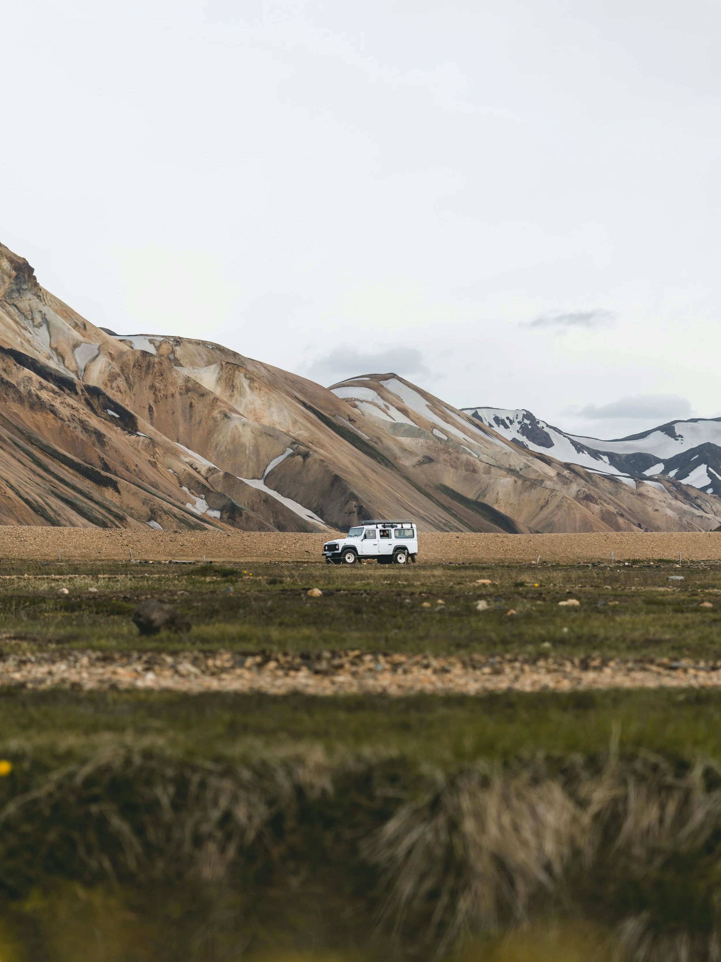 Iceland travel guide roadtrip: sweeping lava fields and mossy terrain along the Ring Road in 2-week itinerary.