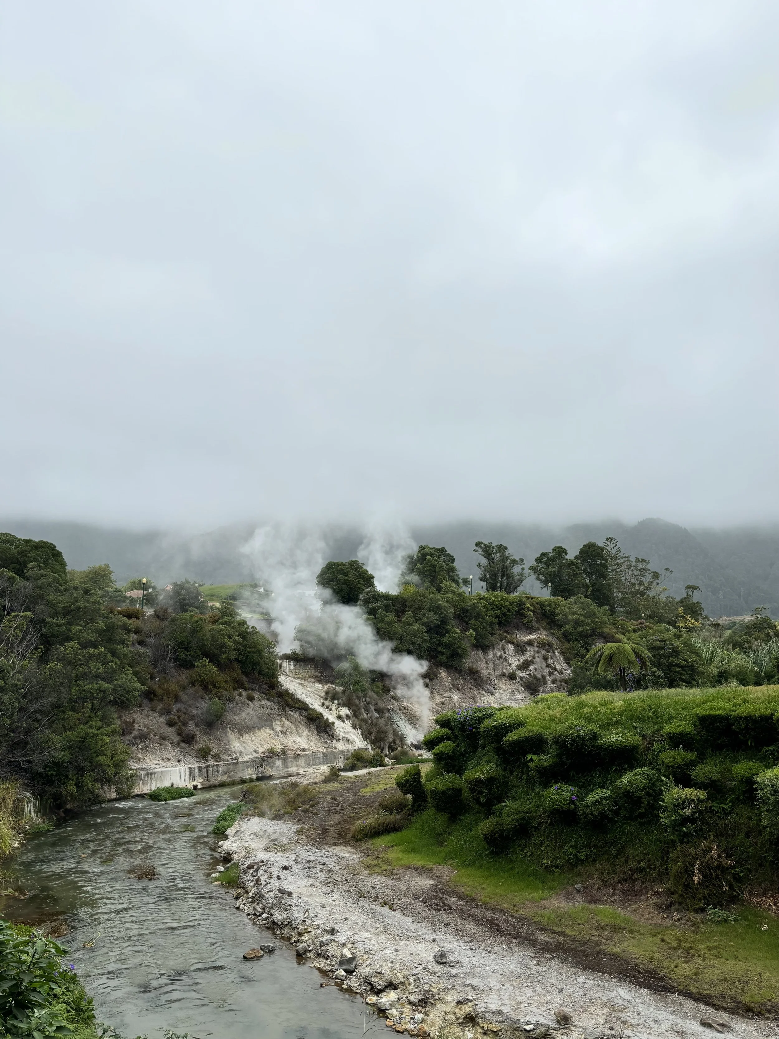 Bubbling caldeiras (hot springs) in Furnas, São Miguel — geothermal activity and local food experiences.