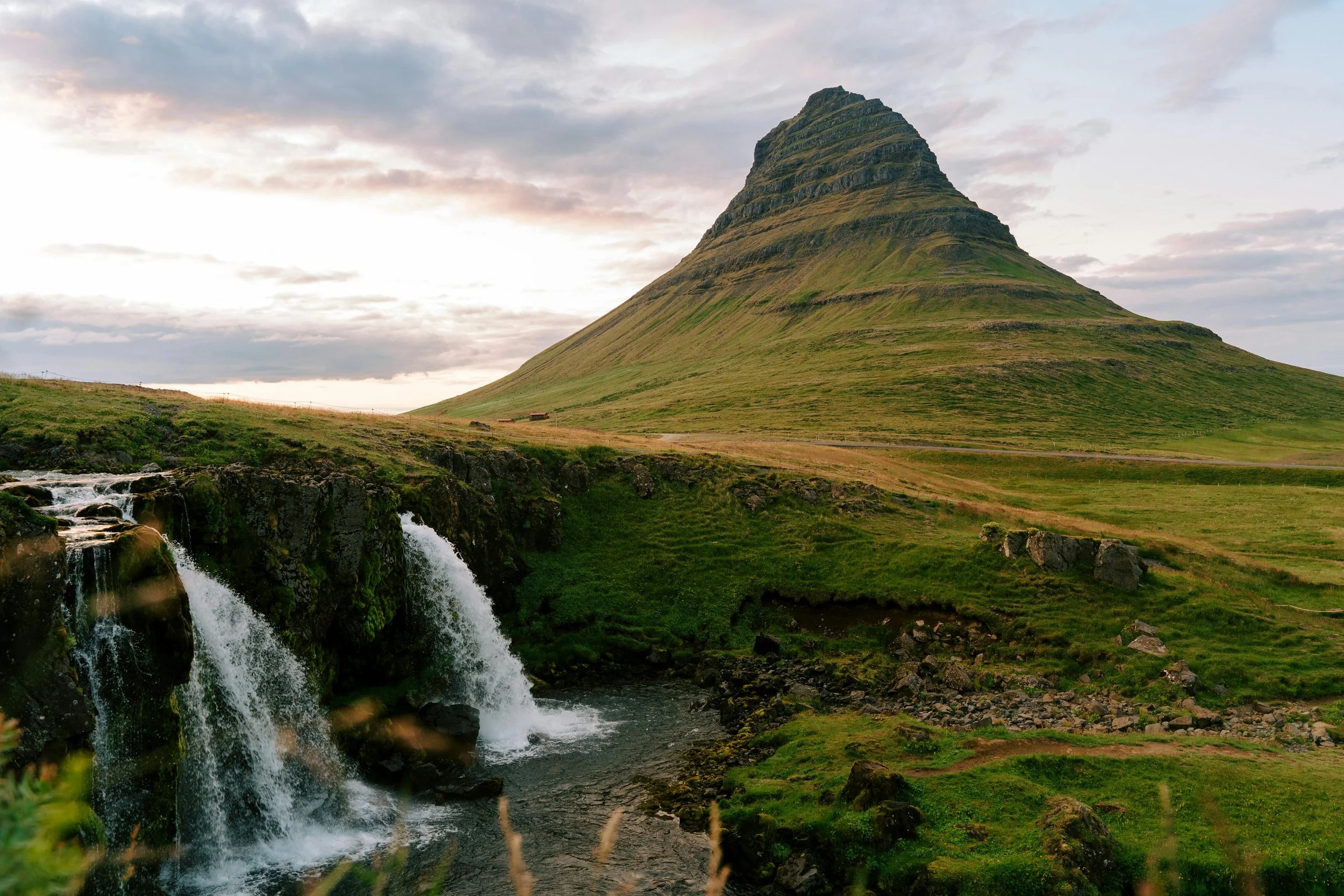 Kirkjufell mountain and waterfall, a famous photography spot in Iceland’s Snæfellsnes Peninsula.