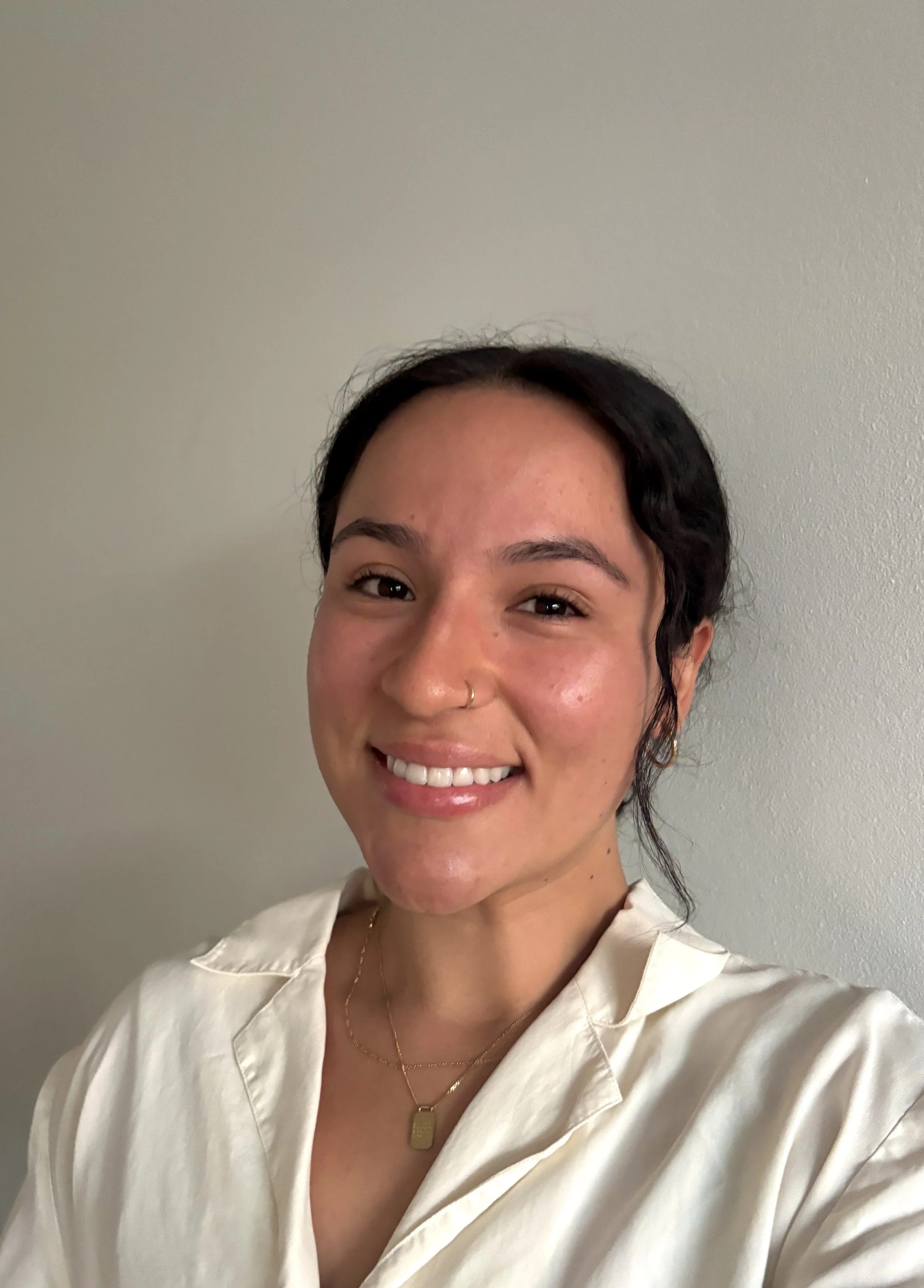 Female with a white collar top