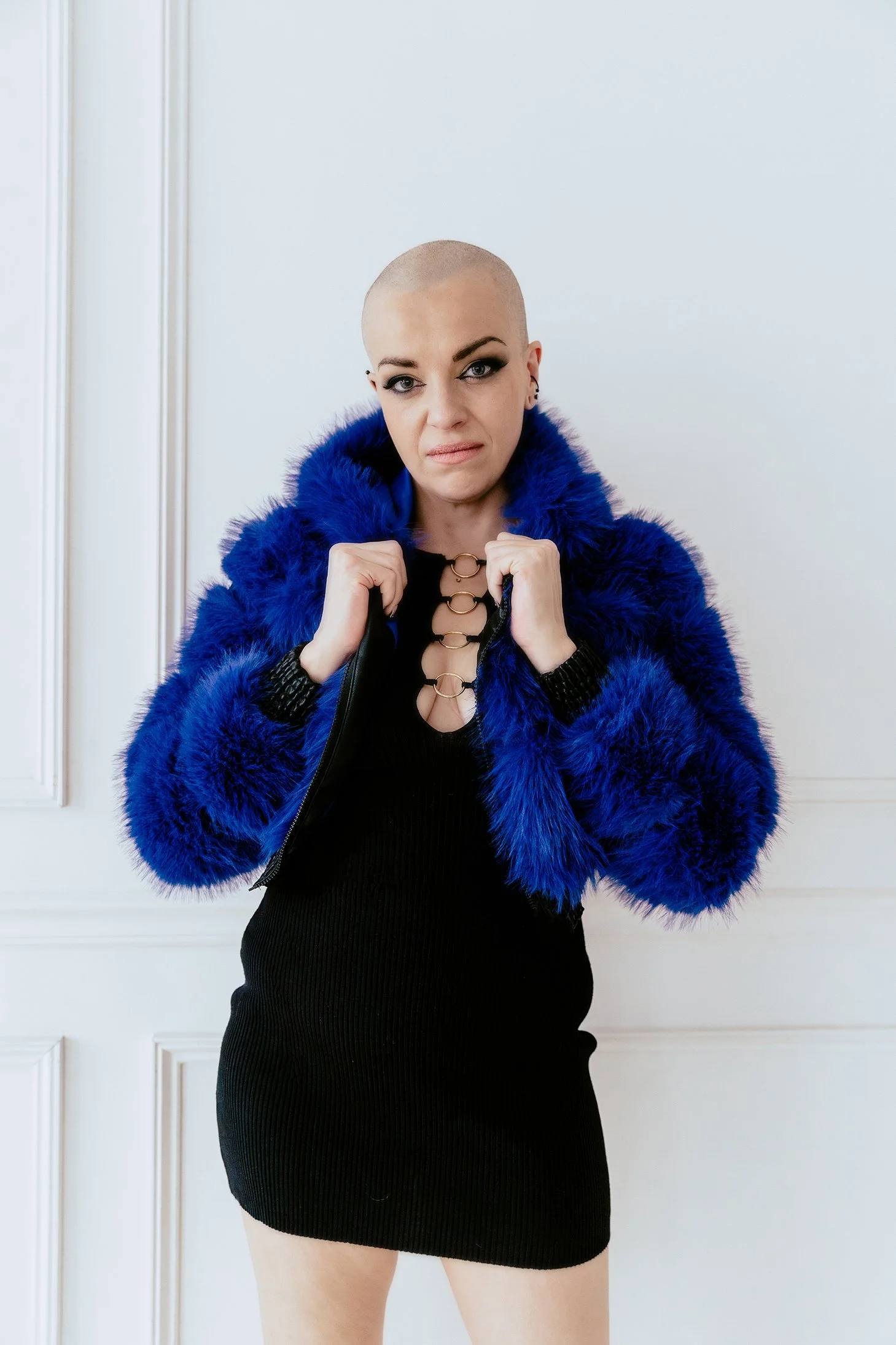 Detroit area creative portrait of a woman wearing a blue jacket during a Pontiac portrait session