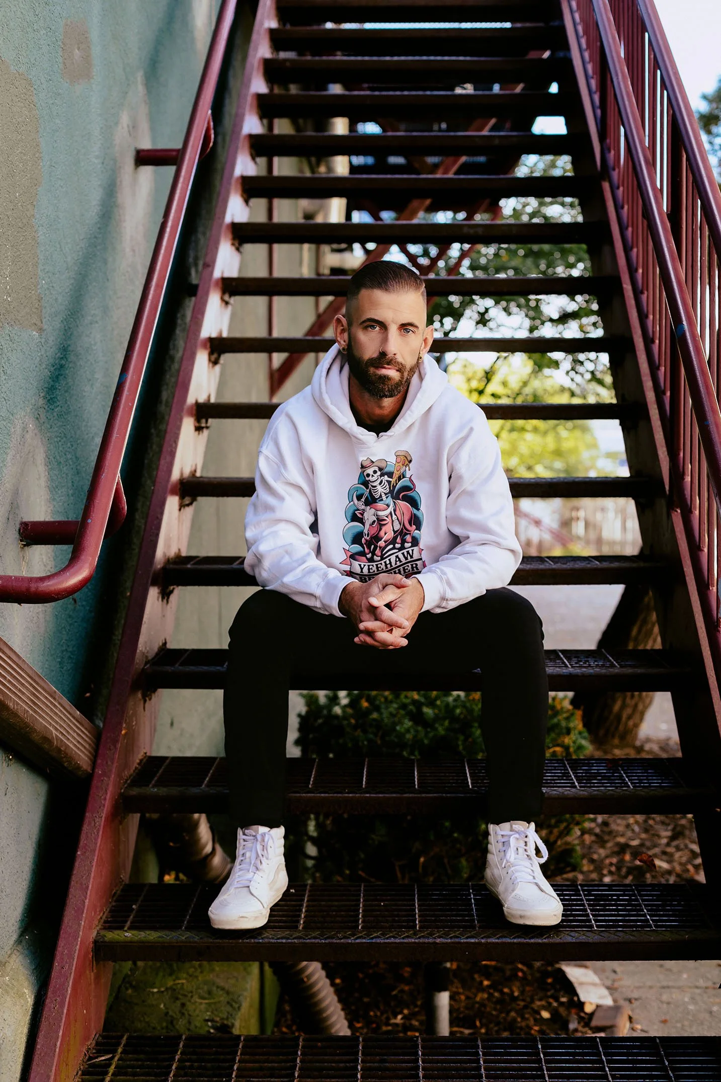 Skeleton Pizza Supply Co branded hoodie photographed in Pontiac Michigan