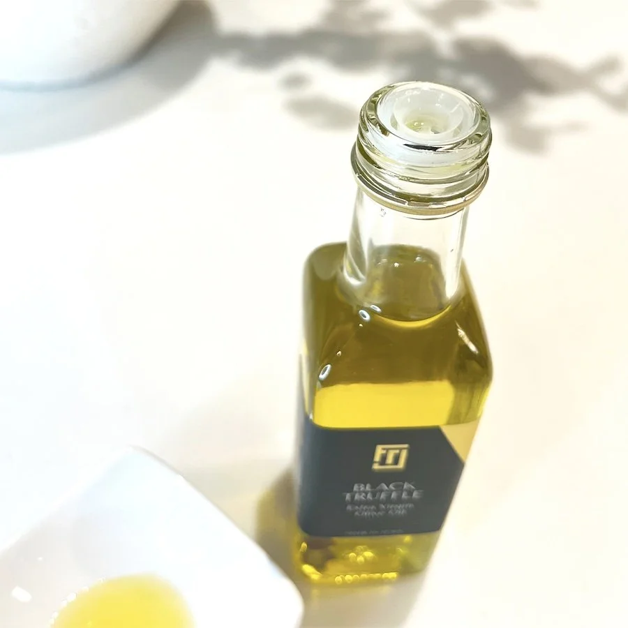 opened truffle oil bottle