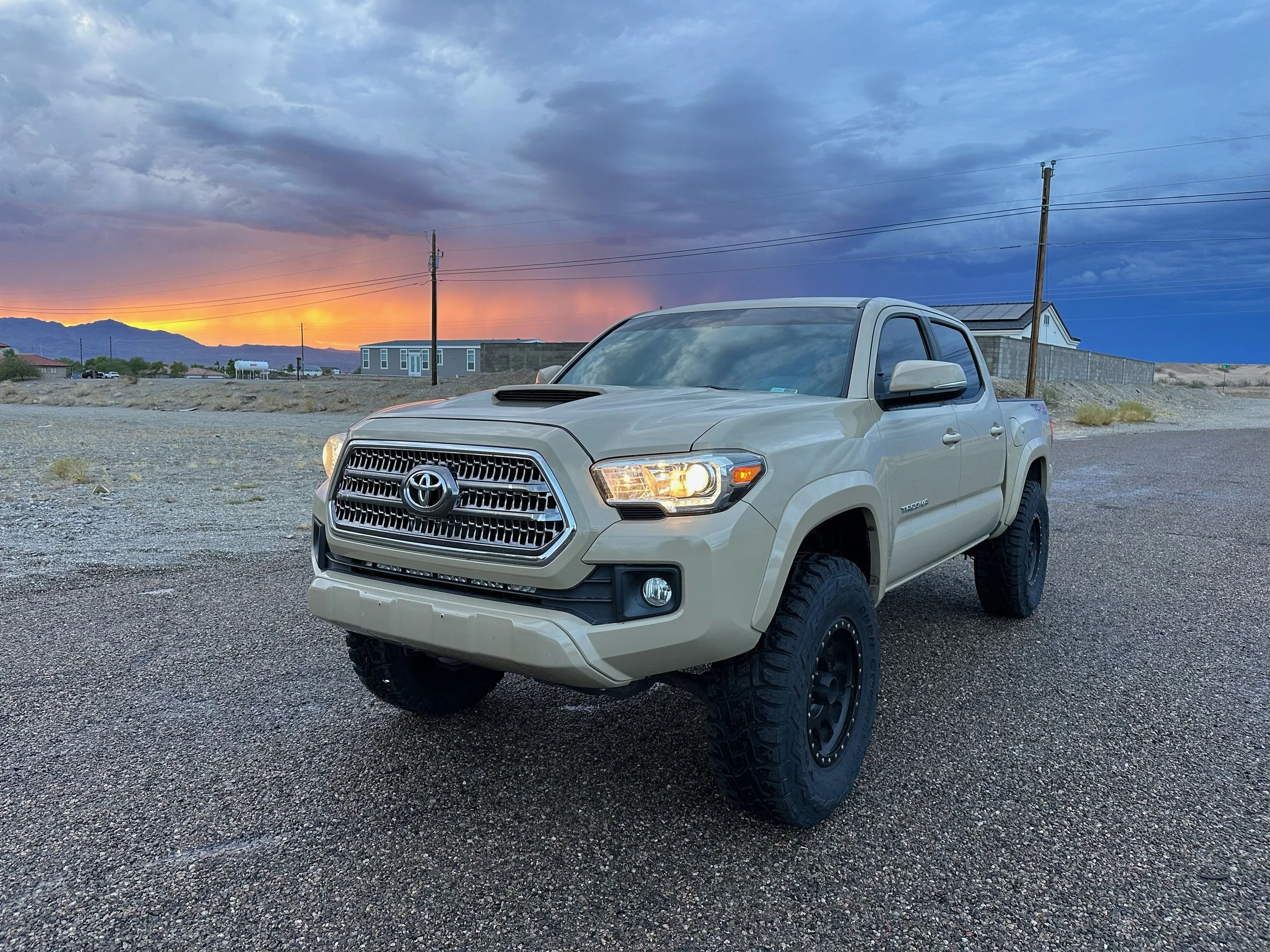 tacoma in the desert in front of a sunset