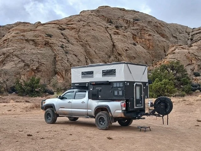 A four wheel tacoma with a rooftop tent on top and ready to camp and explore Arizona.