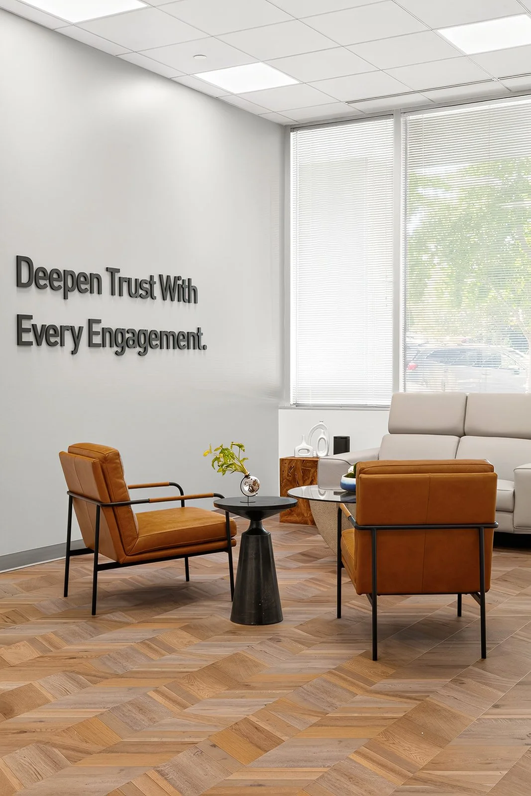 Corporate Lounge area, warm neutral scheme