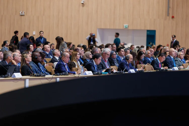 Delegates gathered during multilateral negotiations.