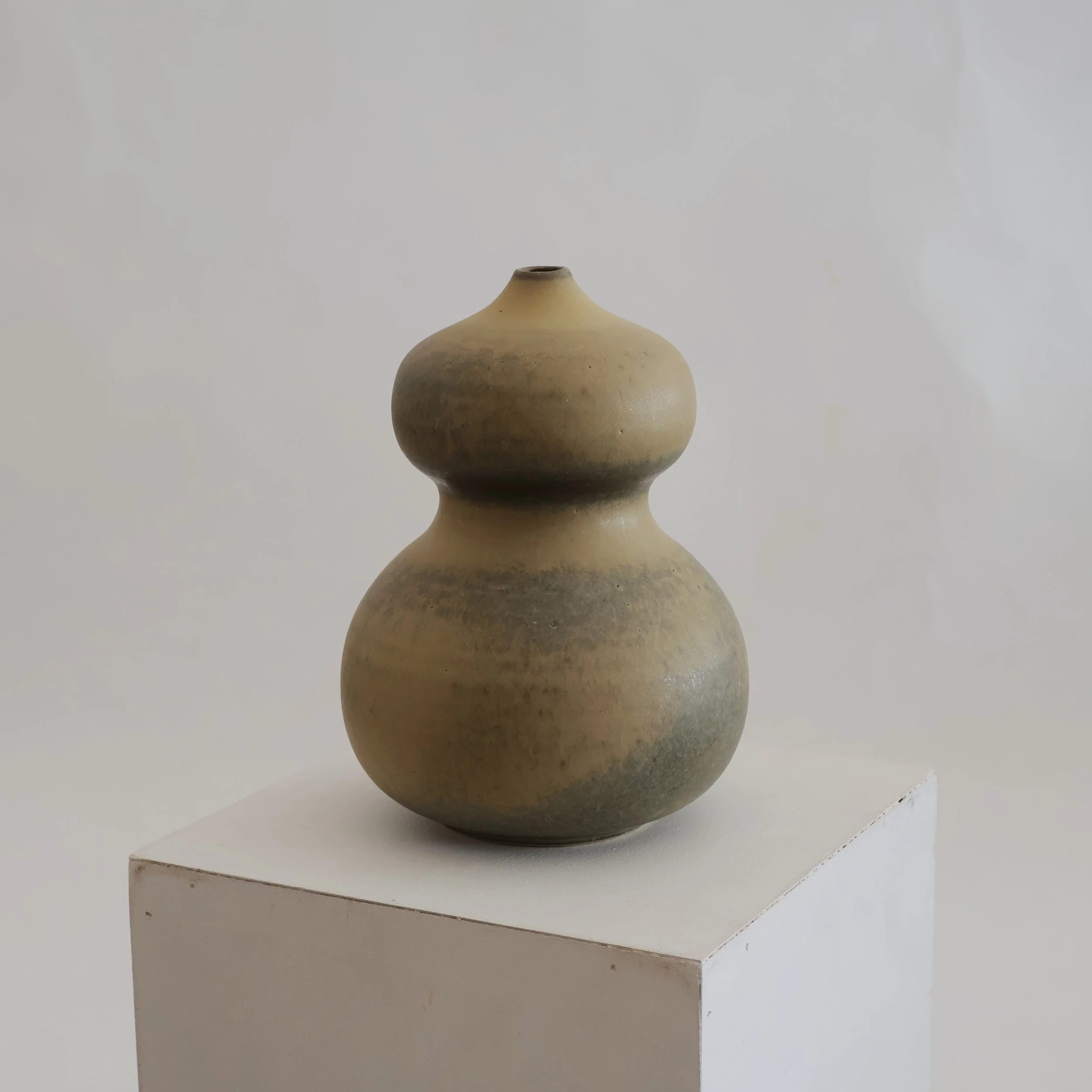 Matte Green and Brown Curved Vase