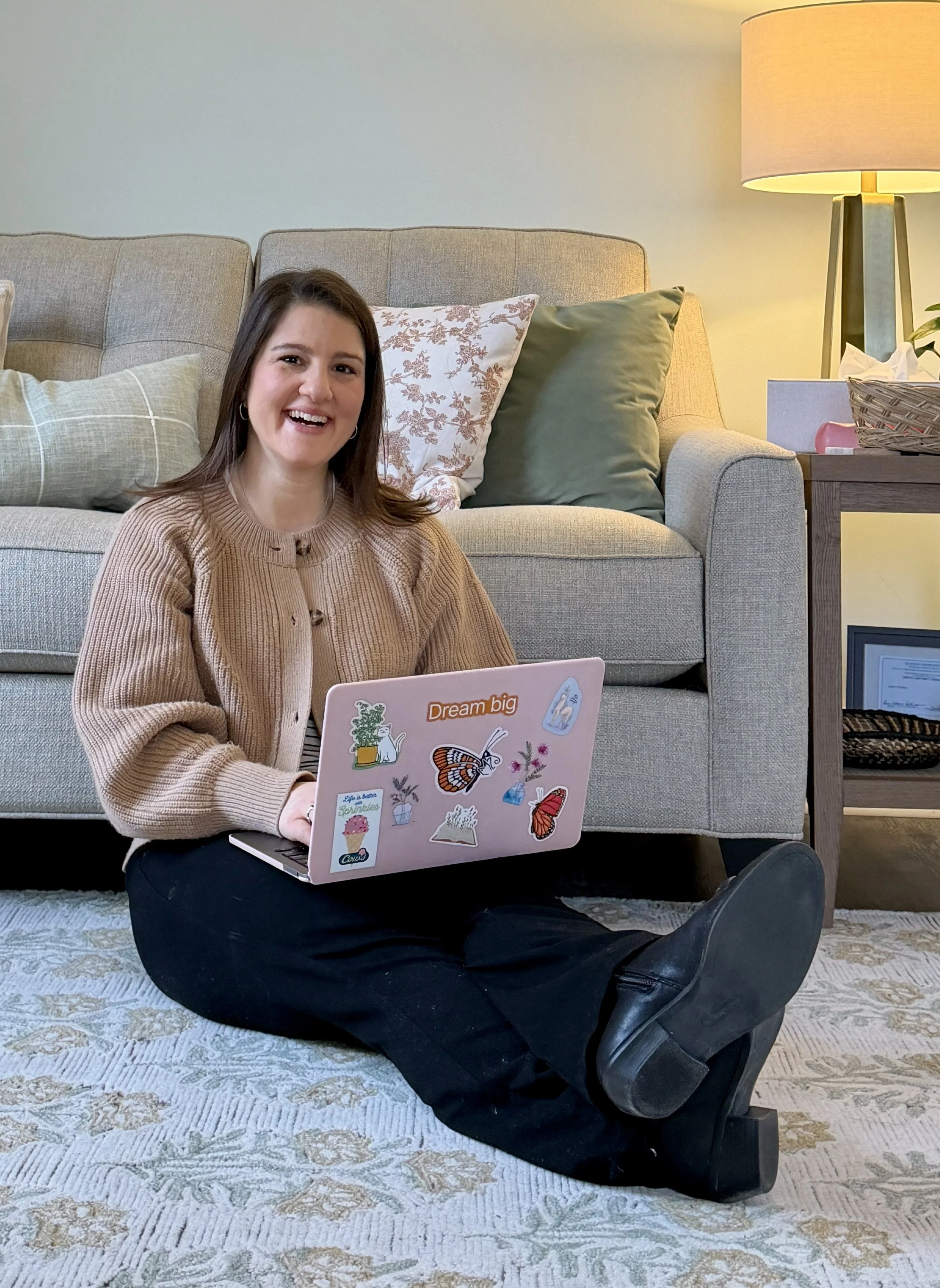 Therapist Laura DeCapua in a welcoming counseling space.