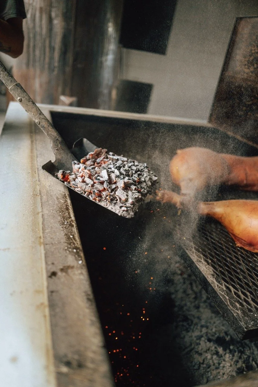 Elliotts smokes his whole hog, chicken, fish, ribs, steak, and more over real wood coals.