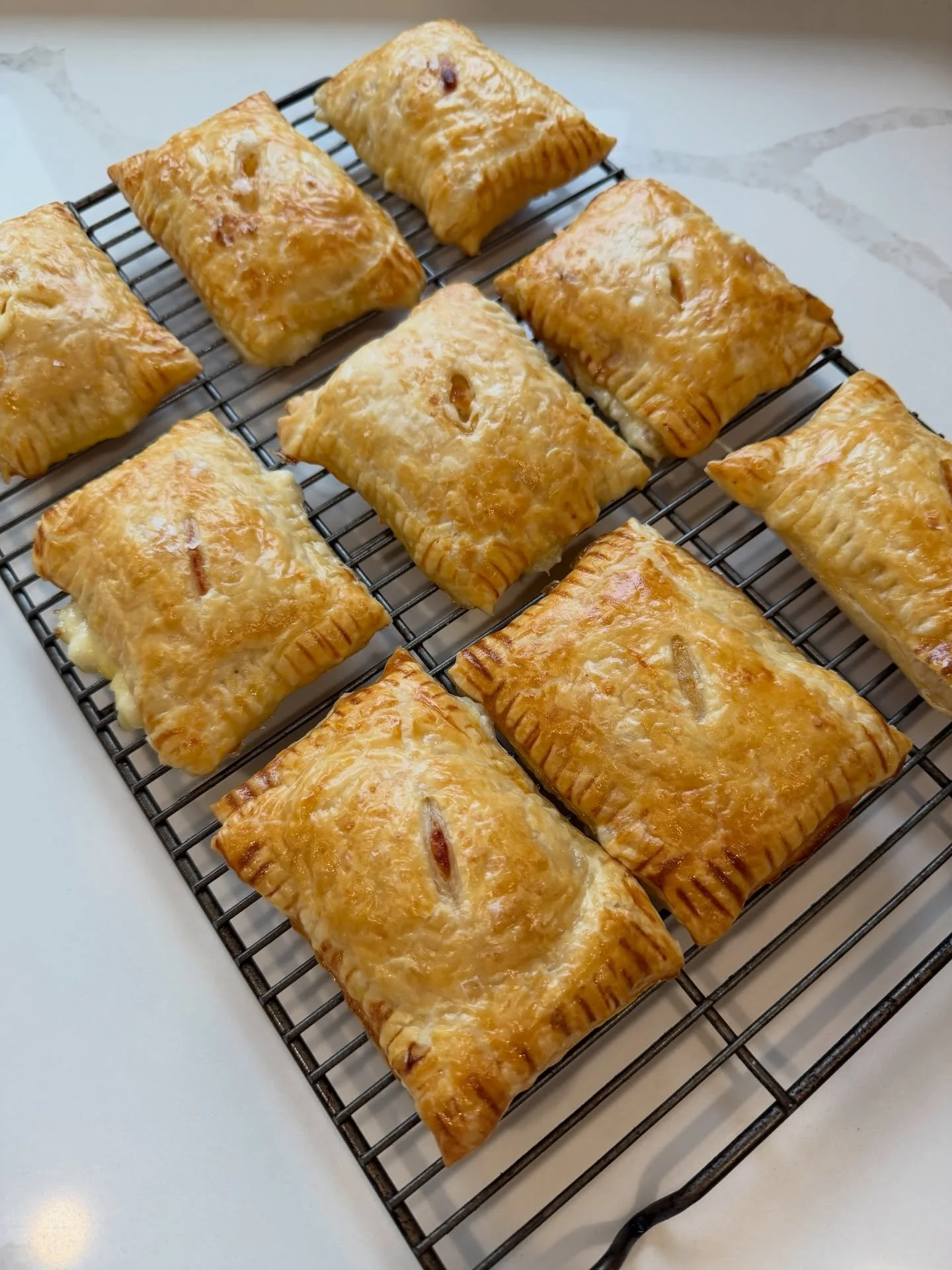 If you love delicious things I highly recommend you pick up some puff pastry (&lsquo;tis the season), fill it with something delicious (mustard, cheddar, ham &amp; honey pictured here). Seal it with a fork like a perfect little package, brush with eg