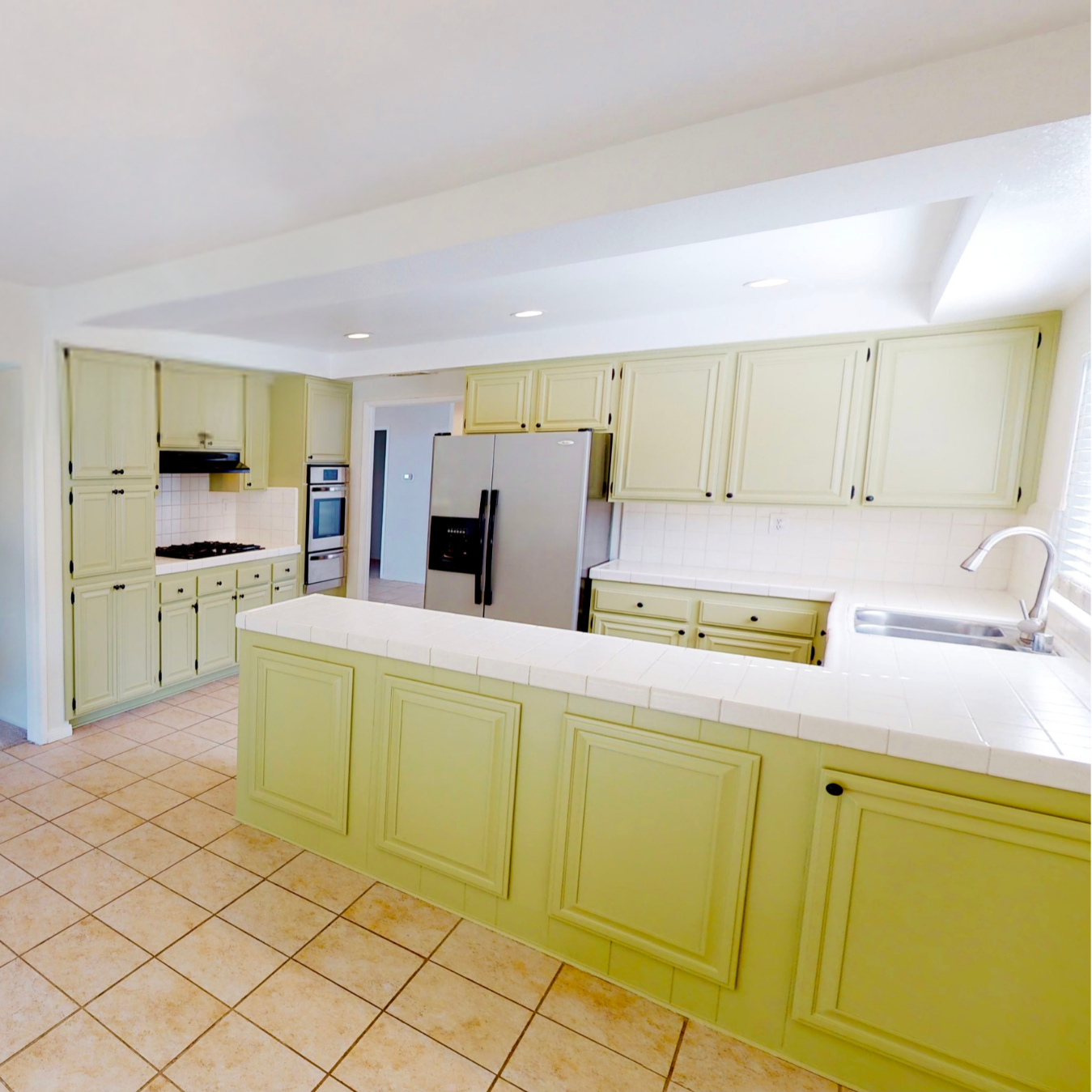 9533-Gladbeck-Ave-Kitchen-LightRemoved_Squared.png