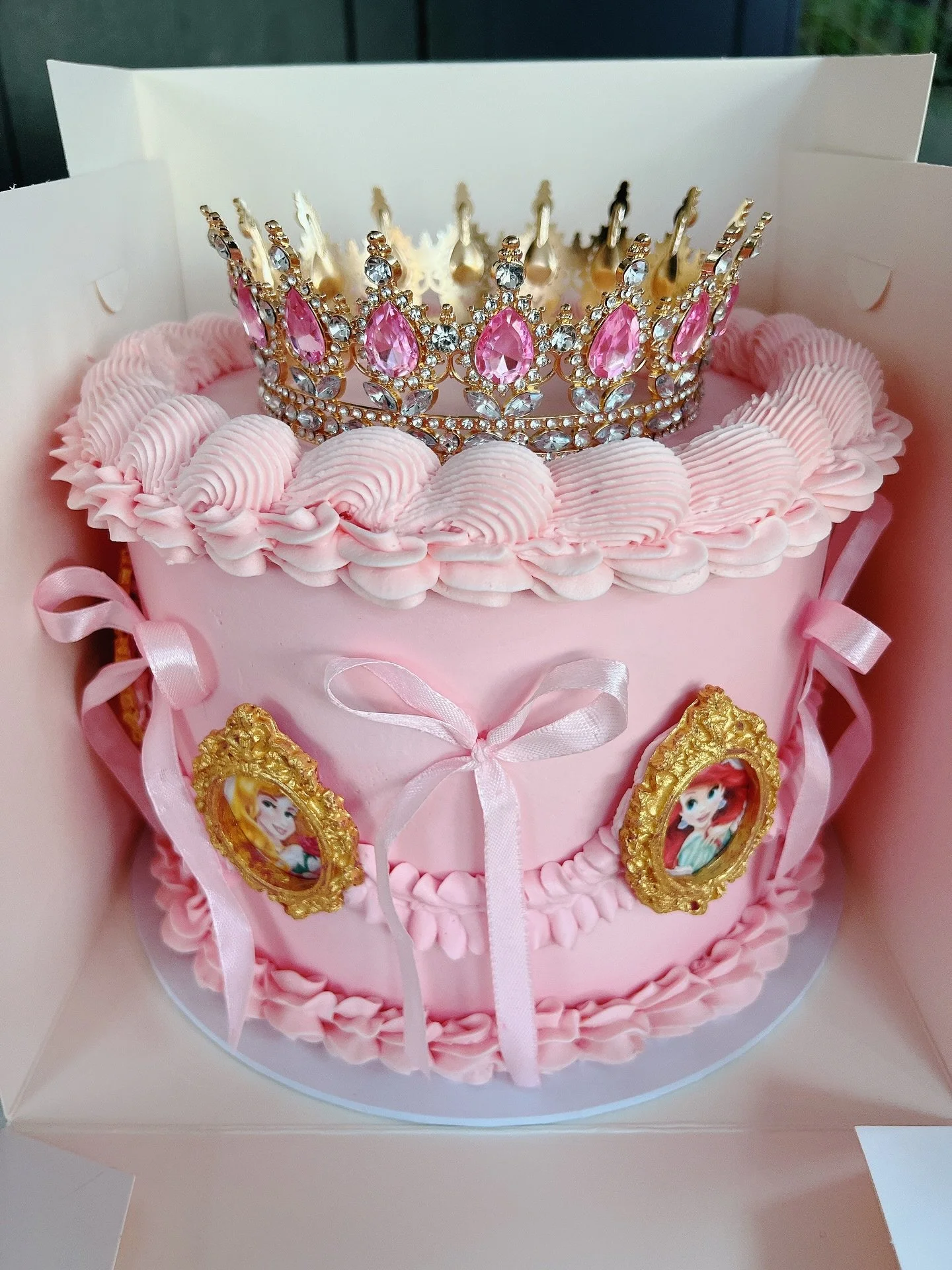 I was thrilled to create this Perfect Princess Cake, one of the most coveted trends of the season.

Every detail was crafted with care - from the delicate candy melt frames to the hand-tied satin bows, and the elegant vintage piping that framed each 