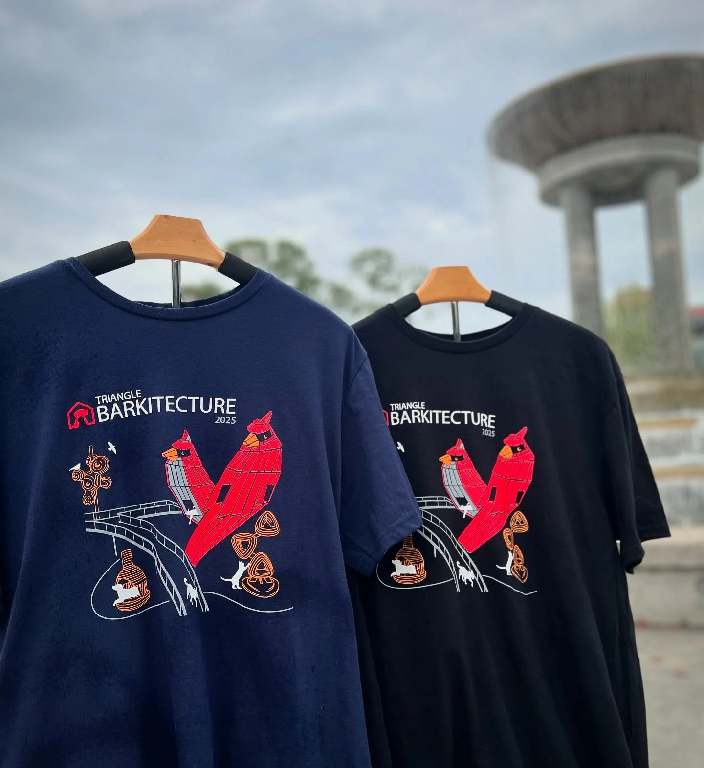 Make sure you stop by early at Triangle Barkitecture to pick up the 2025 Event shirt inspired by Downtown Cary Park - available in navy or black in limited quantities. 🐾🐶

All proceeds from shirt sales will go right back to supporting local rescues