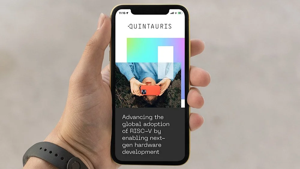 A smartphone displaying the website for RISC-V business Quintauris