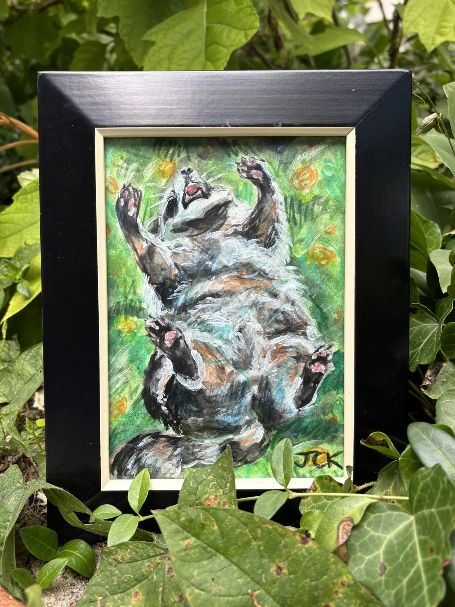 Raccoon, 2026, 5x7 inches, gouache and colored pencil on multimedia paper in a 7x9 thrifted frame