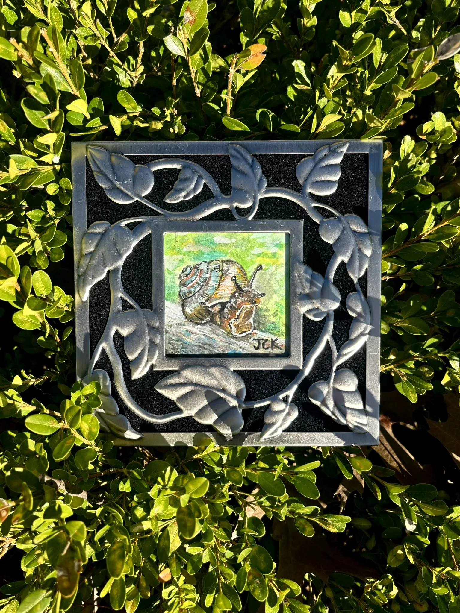 Snail, 2026, 3x3 inches, gouache on multimedia paper in a 7x7 inch thrifted frame