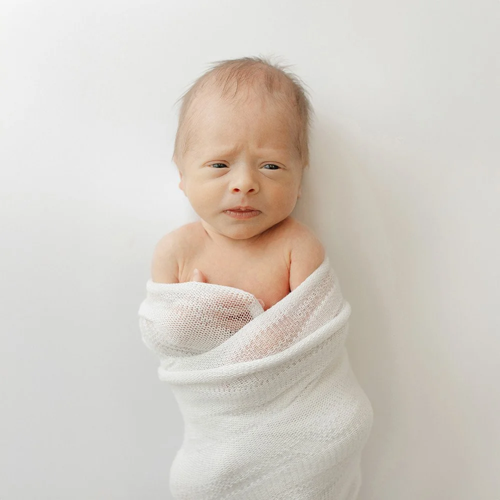 Hey there, lovely mamas and papas! 👶💖

Let me walk you through what a newborn photo session with me feels like. I believe in the magic of natural newborn portraiture&mdash;sometimes, all it takes is a simple swaddle and the perfect light to create 