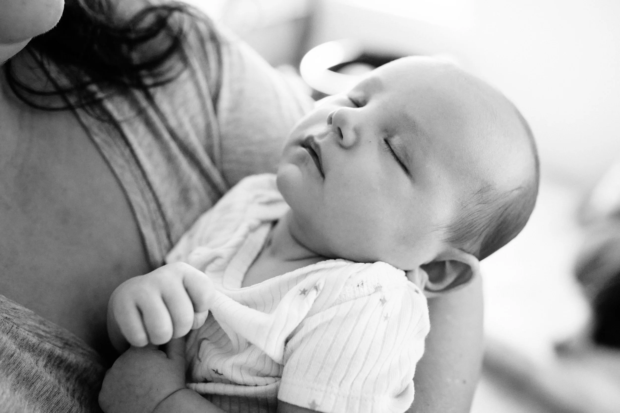 black and white newborn sleeping close up.jpg
