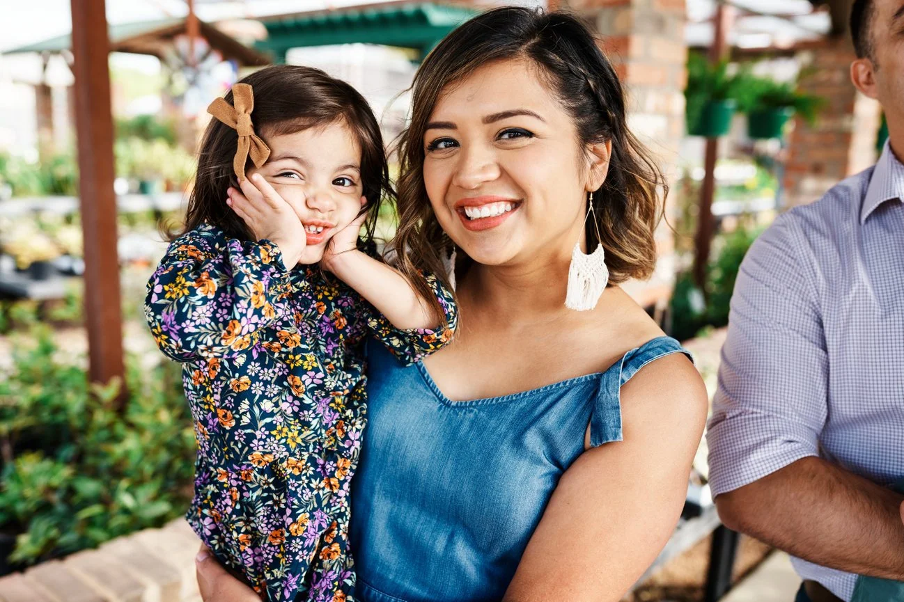 Mom and daughter Portrait in greenhouse funny.jpg