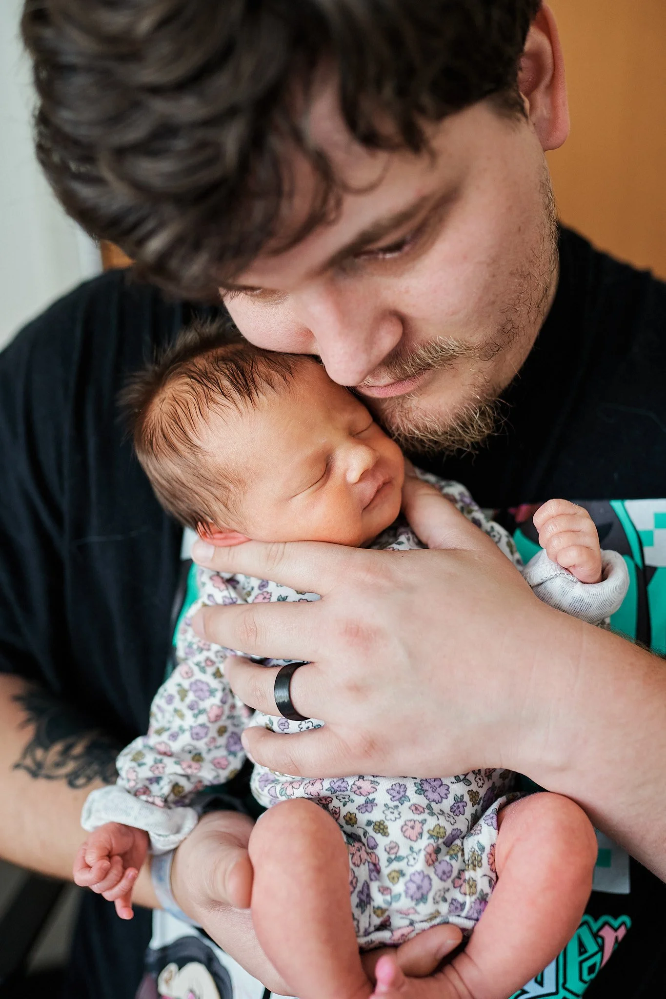 Fresh 48 Dad Holding Newborn.jpg
