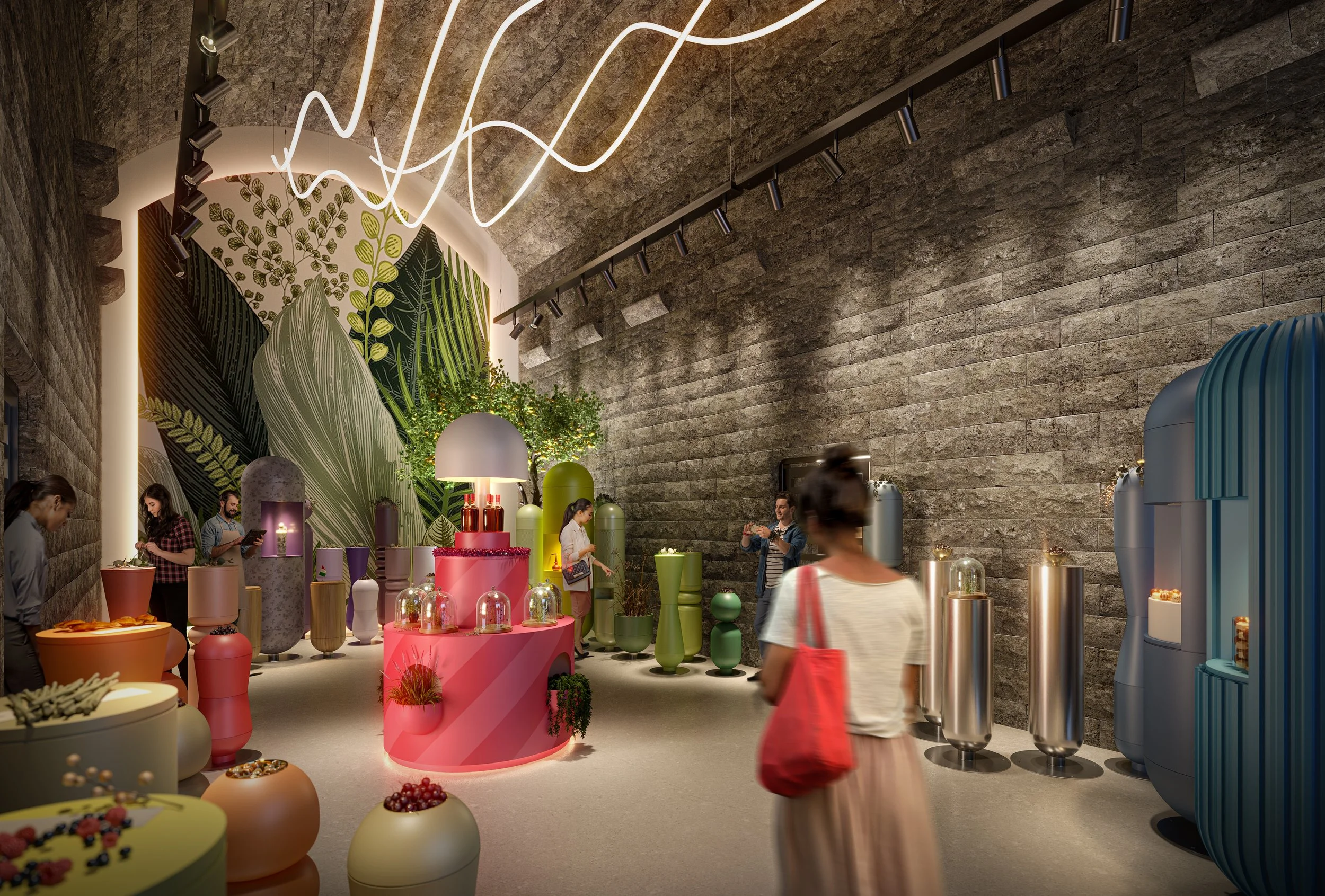 Interior of Edinburgh Gin Distillery with colorful vases, plants, and people exploring, against a textured stone wall with a large leafy mural and modern lighting.