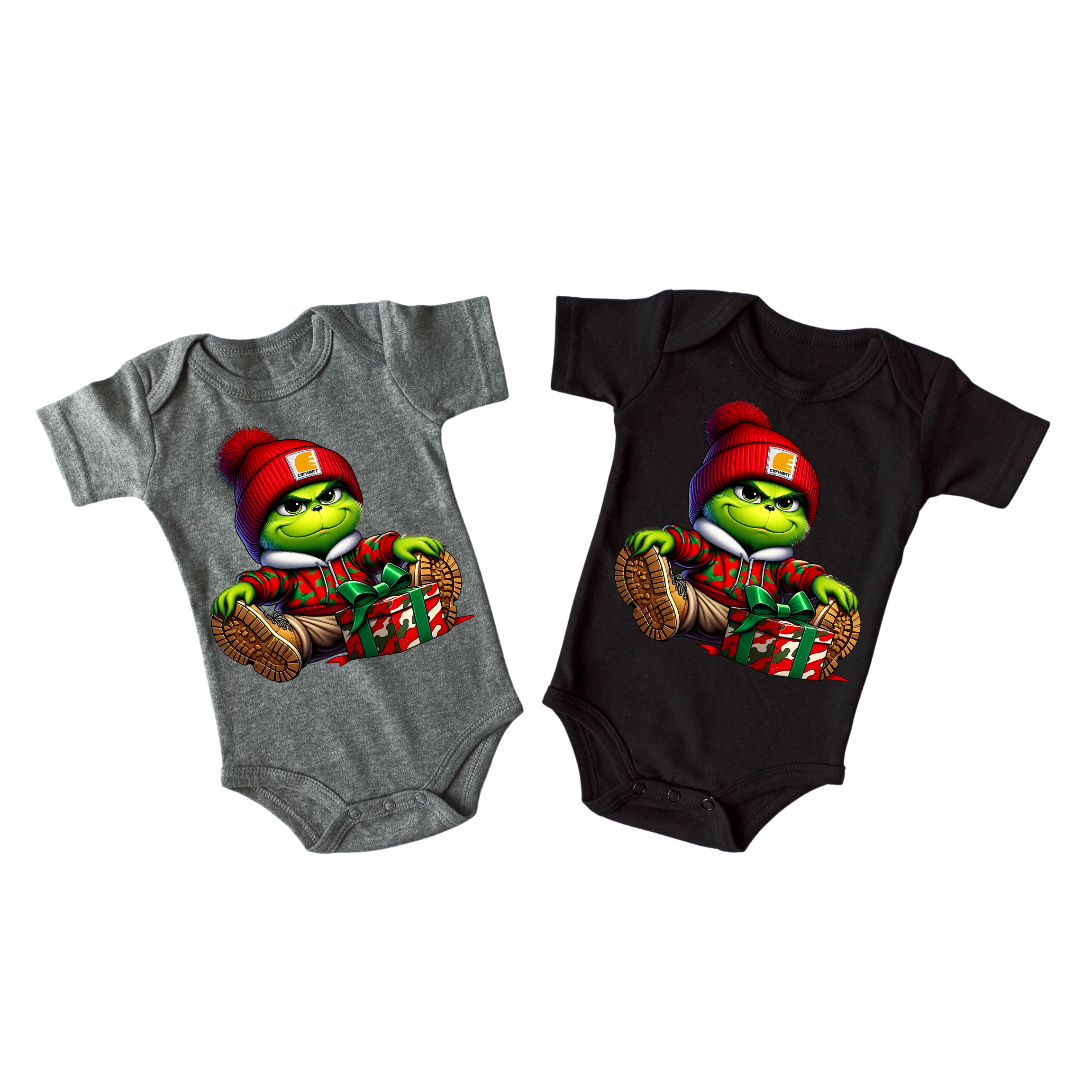 Two children's T-shirts with cartoon grumpy-green face character wearing a red beanie hat and a red jacket, spaced apart on a white background.