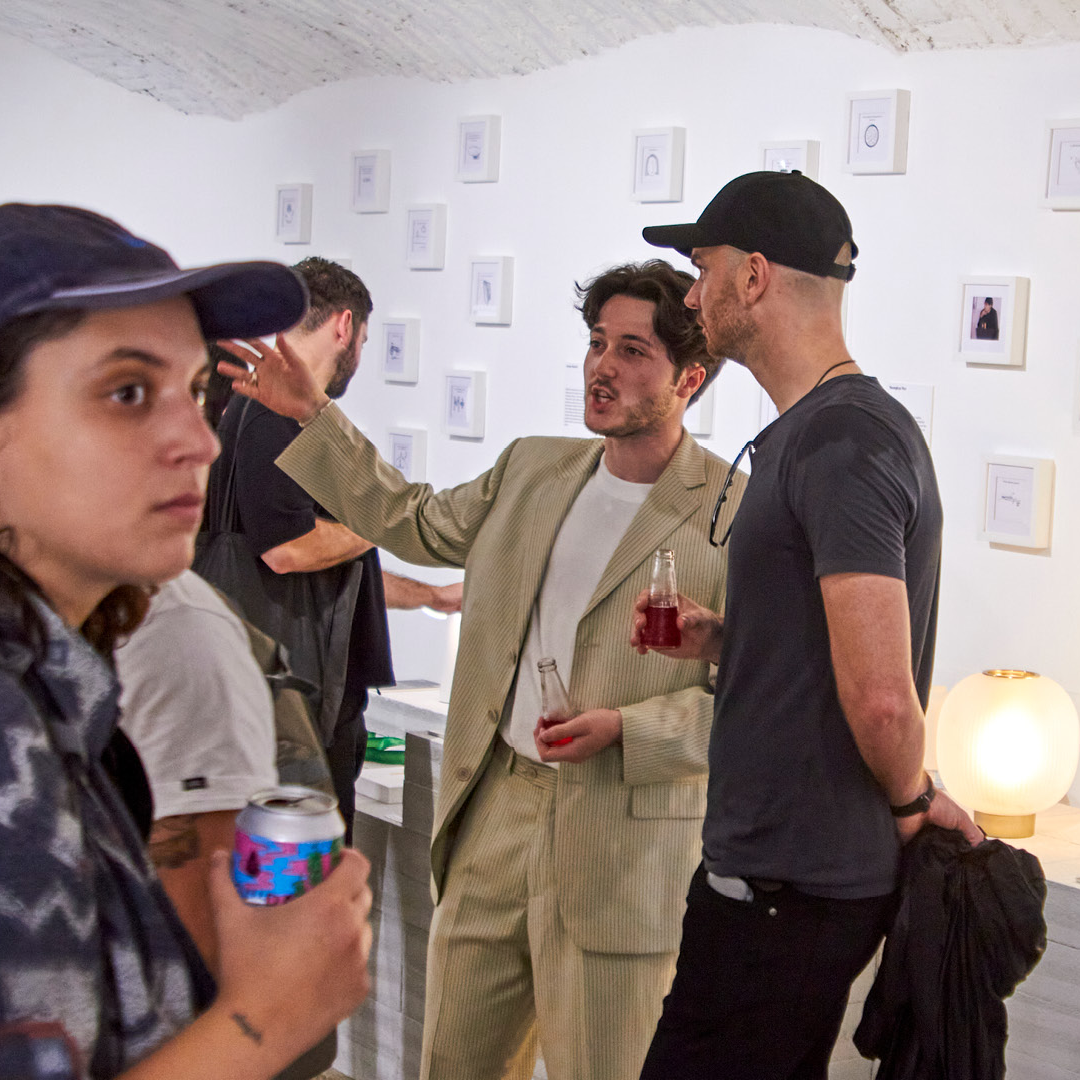 Design Burger founder speaking with Benjamin Hubert of Layer at the Milano exhibition opening.