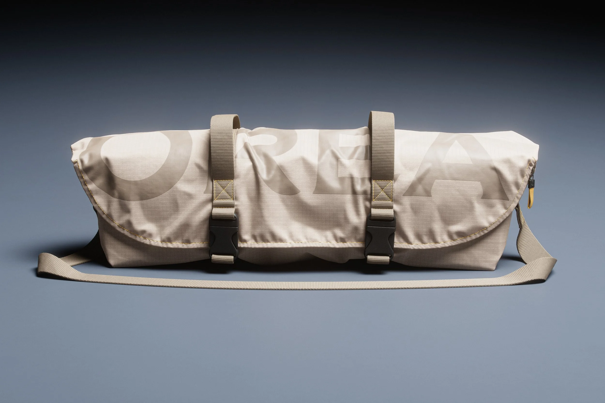 Orea travel crib folded down to a small compact form that fits into a custom designed, easy to pack convenient carry bag.